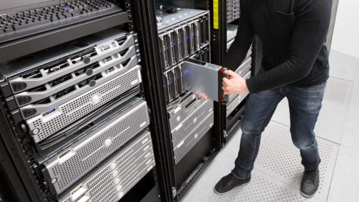 IT Technician Installing Blade Server In Chassis At Datacenter - Rocky ...